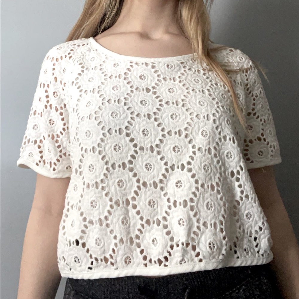 White cropped-ish top; brand: sugar-lips, flower print
